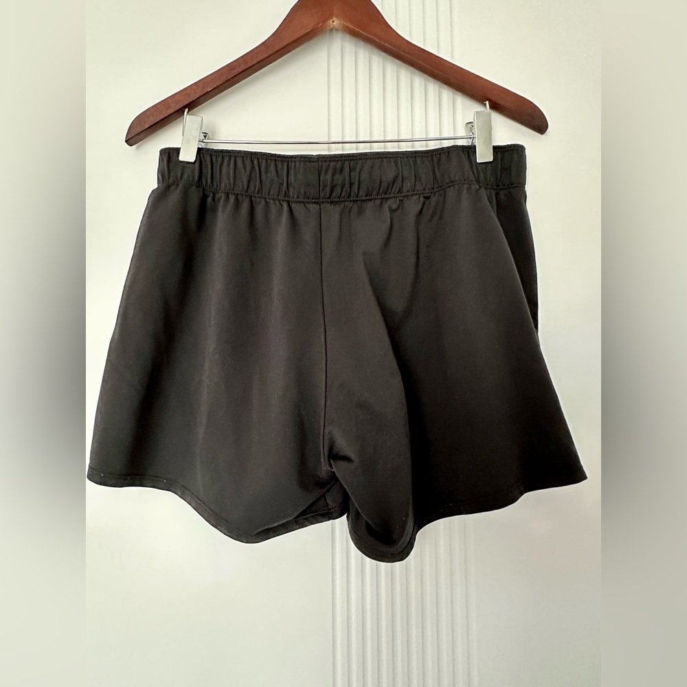 Nike shorts, in black. Size M.